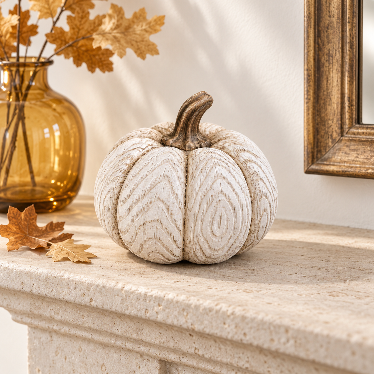 Betty Boop whitewashed pumpkin styled on a bright fall fireplace mantel