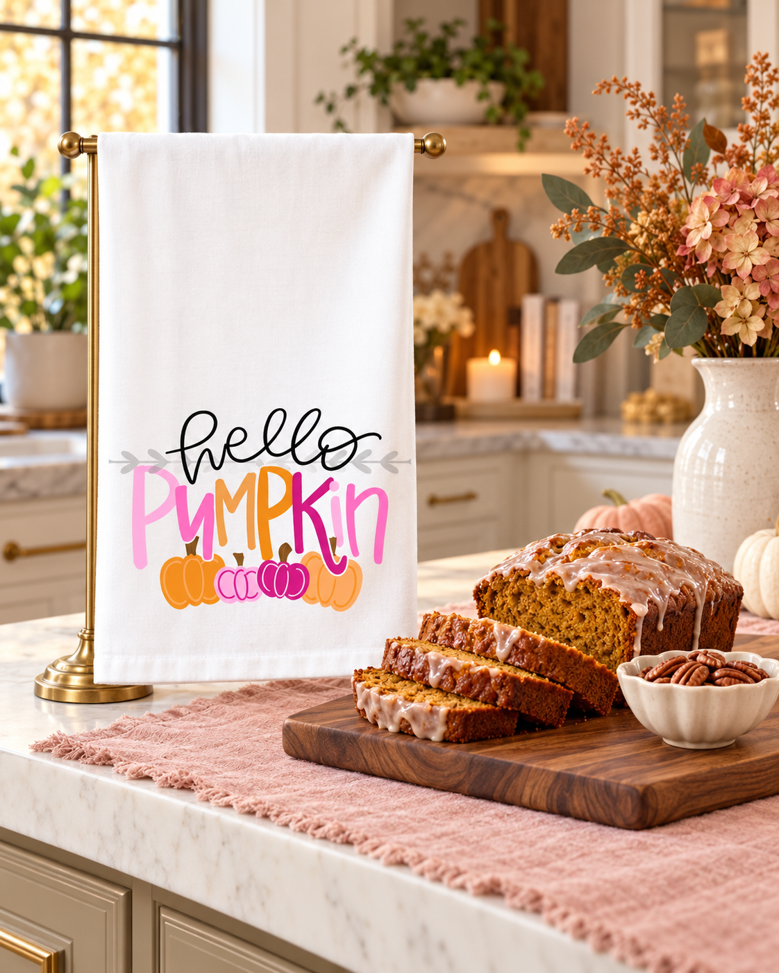 Hello Pumpkin Pink Tea Towel styled with glazed pumpkin bread in a fall kitchen