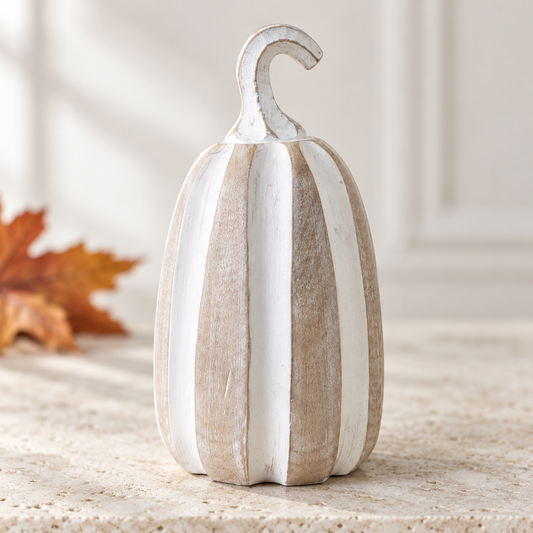 Close-up of Pippin tall pumpkin distressed white and natural wood-look finish